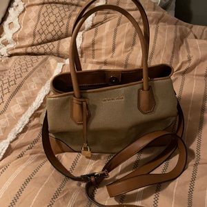 Michael Kors handbag with crossbody strap.
